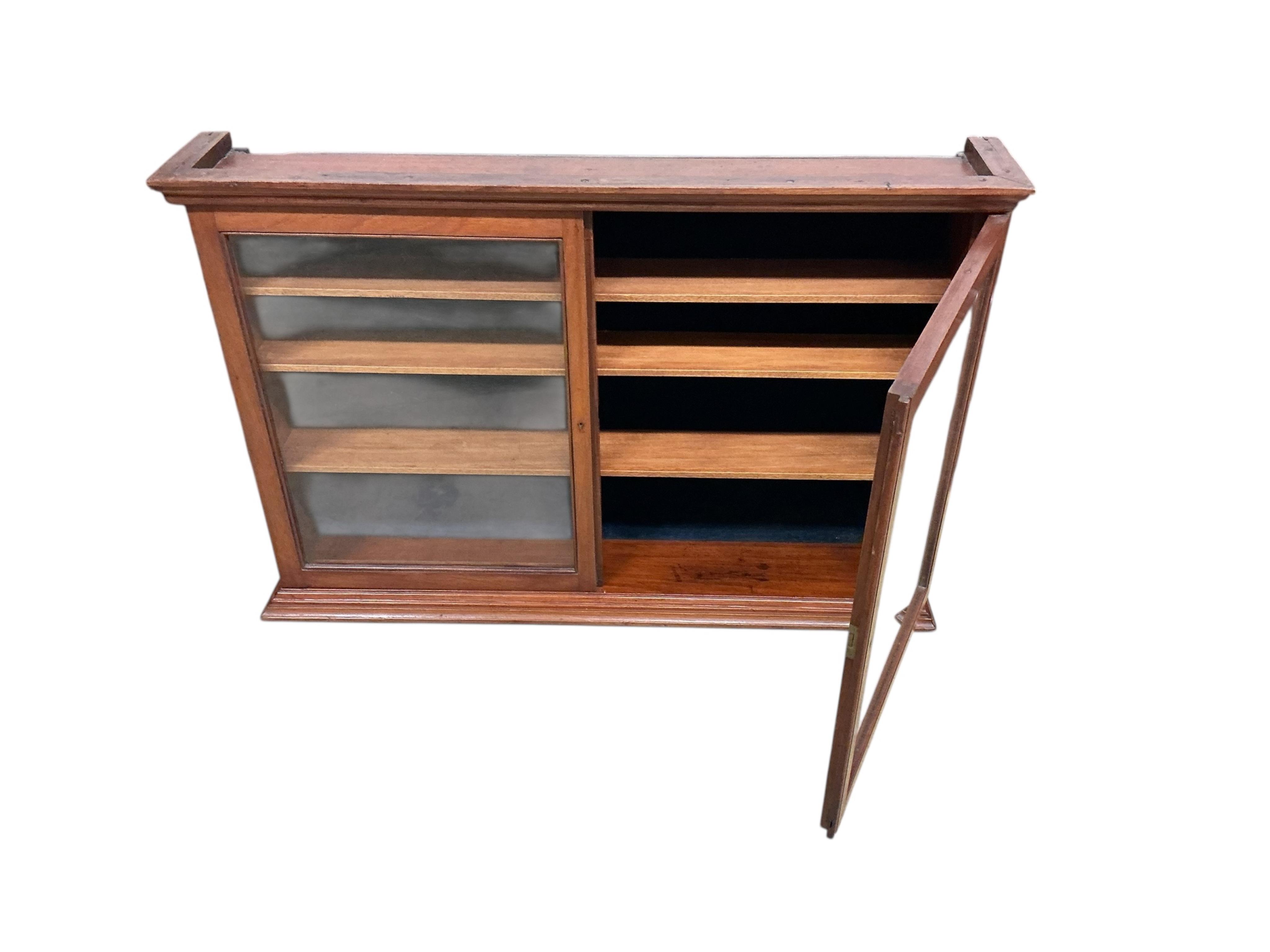 An early 20th century mahogany wall hanging display cabinet, width 96cm, depth 17cm, height 65cm